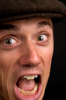 Portrait of a young man making faces.
