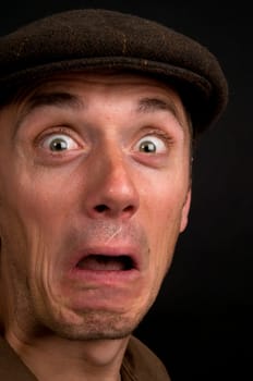 Portrait of a young man making faces.