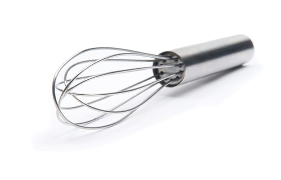 Closeup of a wire whisk, on white.