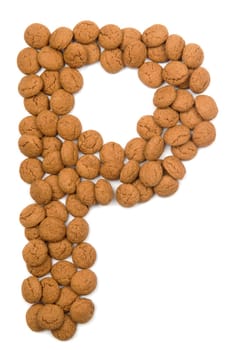 Little ginger nuts in the form of the letter P. These little ginger nuts are used in Holland for the "Sinterklaas"" party, which is at Dec 5 every year. Sinterklaas is a sort of Santa Claus. In Holland these ginger nuts are called ""pepernoot"". Isolated on white."