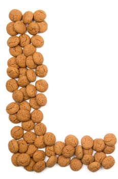 Little ginger nuts in the form of the letter L. These little ginger nuts are used in Holland for the "Sinterklaas"" party, which is at Dec 5 every year. Sinterklaas is a sort of Santa Claus. In Holland these ginger nuts are called ""pepernoot"". Isolated on white."