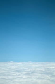 Nice blue sky with white clouds at the bottom