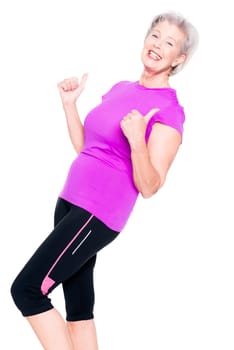 Studio recording of an active senior woman playing sports against a white background