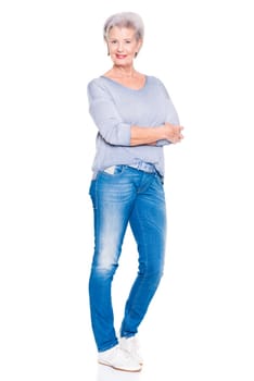 Studio recording of an active and happy senior against a white background