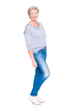 Studio recording of an active and happy senior against a white background