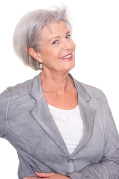 Studio recording of a smiling senior woman against a white background