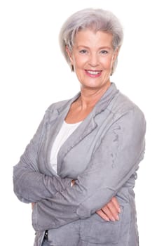 Studio recording of a smiling senior woman against a white background