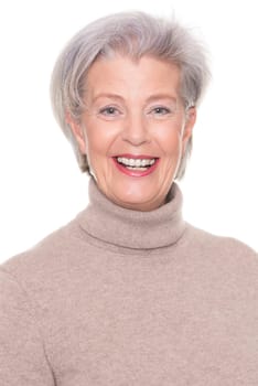 Studio recording of an active and happy senior against a white background