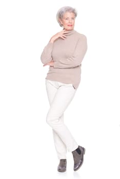 Studio recording of an active and happy senior against a white background