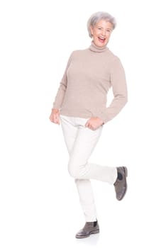 Studio recording of an active and happy senior against a white background