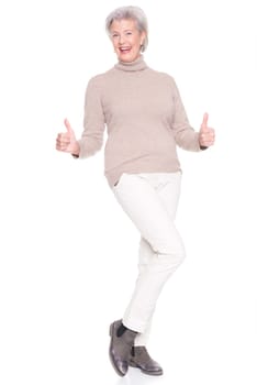 Studio recording of an active and happy senior against a white background