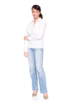 Middle-aged woman wearing a white blouse and blue jeans against a white background
