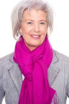 Studio recording of a smiling senior woman against a white background