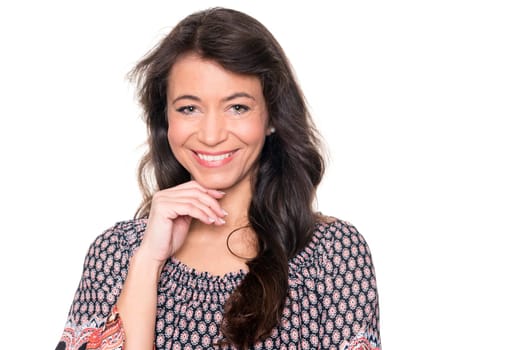 Smiling middle-aged woman against a white background