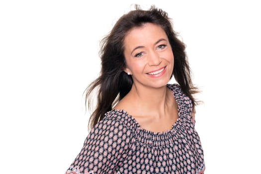 smiling middle-aged woman in front of white background