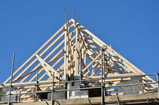 wooden apex roof under construction