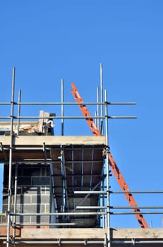 Ladder at angle on building site