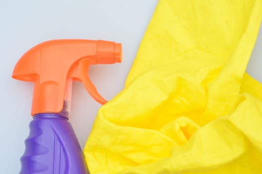 Close up of spray bottle and cloth