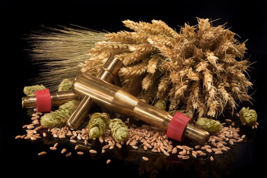 Beer tap with wheat,barley,hops and malt insulated on black