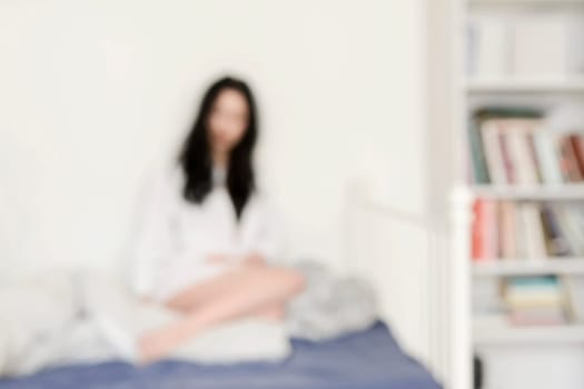 young woman in bed,fuzzy
