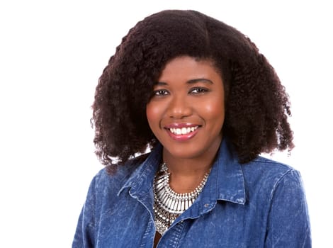 beautiful young black woman is wearing jean dress on white background