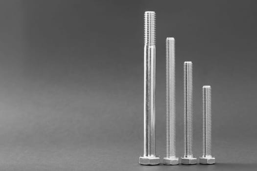 bolts of various sizes isolated as industry concept