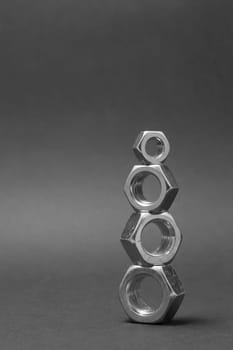 close up of four nuts isolated on gray background