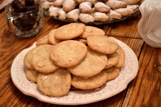 Snickerdoodle cookies on a plate, set our for a Christmas party.