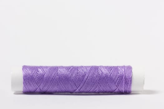 Cotton fabric purple on white background