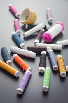 Spool of thread and pins. Sewing accessories