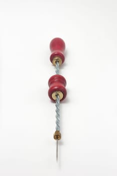 Hand drill with wood handle red isolated on white background