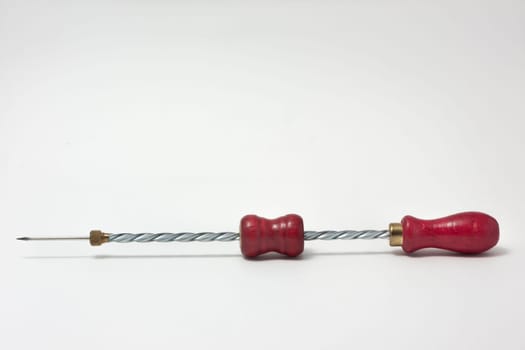 Hand drill with wood handle red isolated on white background