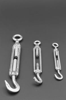 metal turnbuckles fastening of cables with steel rod