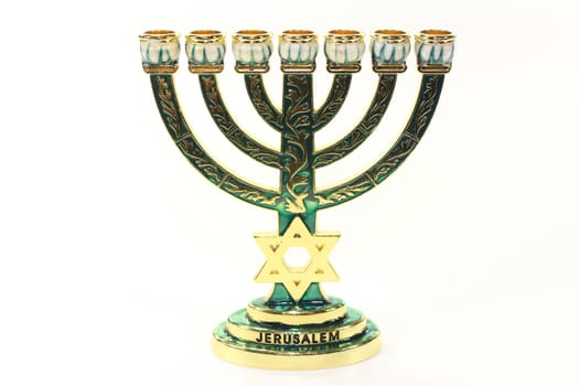 Jewish candlestick against a white background