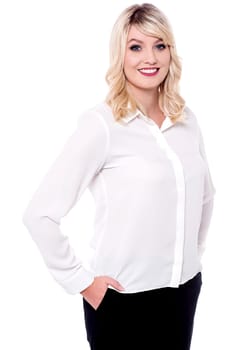 Young confident business woman posing in style