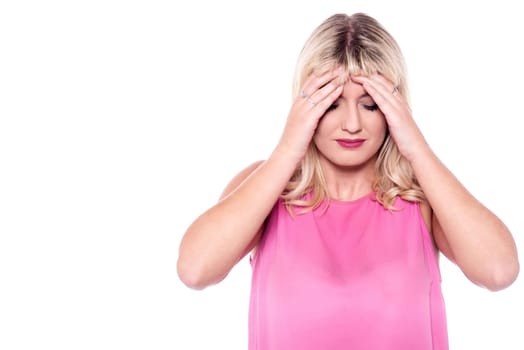 Lady suffering from severe headache