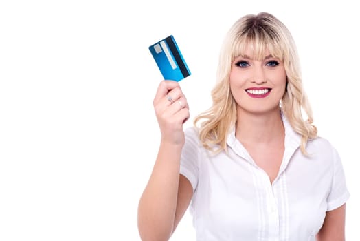 Beautiful woman showing credit card