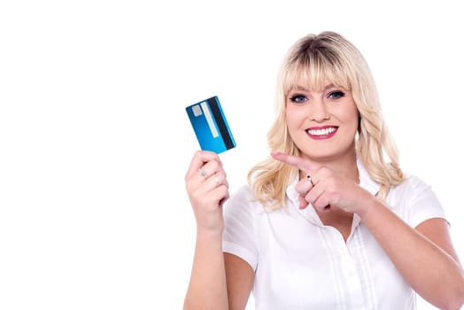 Attractive lady pointing at smart card