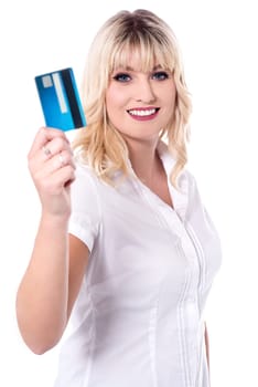 Cheerful shopaholic lady holding debit card