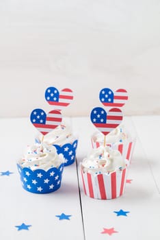 Decorated cupcakes on white table to celebrate July 4th