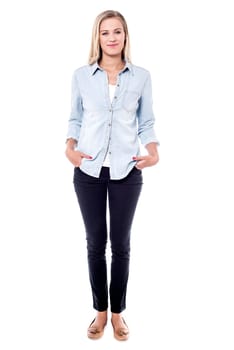Delightful woman in casuals posing stylishly