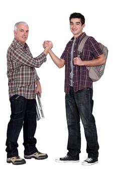 Manual worker welcoming intern