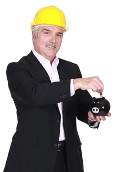 Architect with a piggy bank.
