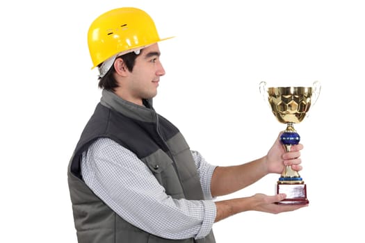 Construction worker with an award