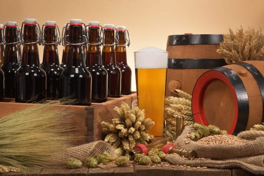 old beer carrier with beer glass,wheat,barley,hops and malt