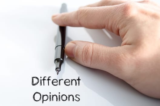 Different opinions note in business man hand