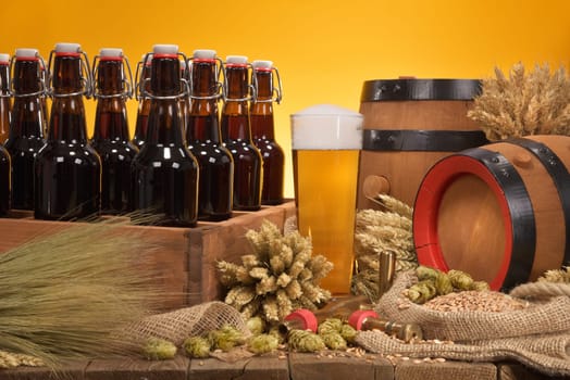 old beer carrier with beer glass,wheat,barley,hops and malt