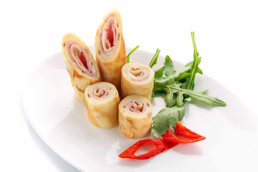Delicious buffet,  with pancakes , herbs and pepperr  on  white background