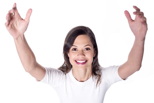 Happy woman with raised arms over white