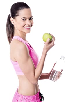 Healthy lady with a green apple